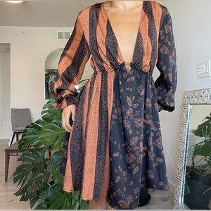 Black & orange striped midi dress with cutout detail